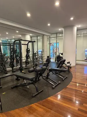 a gym with several treadmills and exercise bikes at KLCC Marc Residence by AZ Line in Kuala Lumpur