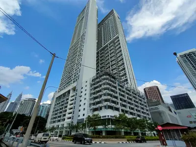 a large tall building in the middle of a city at The Colony By Infinitum KLCC - Aura Suites in Kuala Lumpur