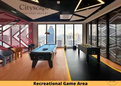 a room with a pool table and a recreation game area at Majestic Residence Kuala Lumpur by Cityscape in Kuala Lumpur