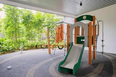 a playground with a slide in a building at TRX Agile Bukit Bintang Cozy 2 Bedroom and 1 Living Room Suites in Kuala Lumpur
