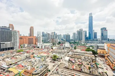 an aerial view of a city with tall buildings at D'Majestic by Aspire Suites in Kuala Lumpur