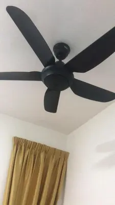 a black ceiling fan on a ceiling with a curtain at Sentul Kuala Lumpur Private Medium Room Home Stay Shared Common Area With Host in Kuala Lumpur