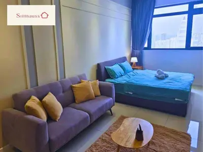 a living room with a couch and a bed at KLCC View Walk to PWTC & Sunway Putra 3 Pax in Kuala Lumpur