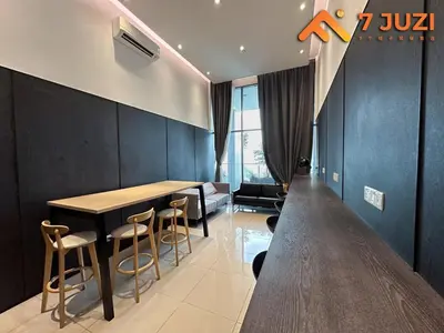 a dining room with a table and some chairs at KLCC 23A Premium 1B1R with Best View Infinity Pool and Netflix 1080HD in Kuala Lumpur