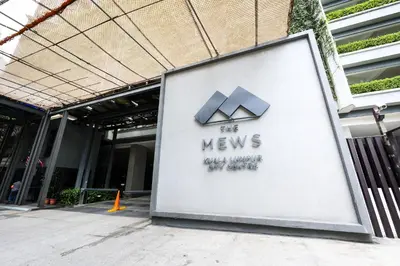 a sign on the side of a building at The Mews KLCC Home Plus in Kuala Lumpur