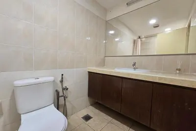 a bathroom with a toilet and a sink at The Meow Loft Fahrenheit Bukit Bintang Kuala Lumpur - Pavilion - KLCC in Kuala Lumpur