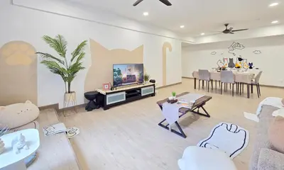 a living room with a tv and a dining room at The Meow Loft Fahrenheit Bukit Bintang Kuala Lumpur - Pavilion - KLCC in Kuala Lumpur