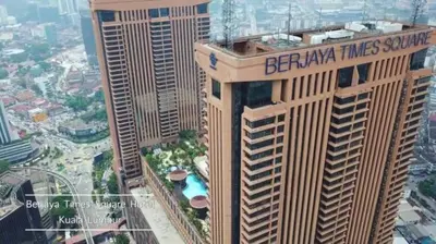 a tall building with the words bahrain times square on it at Times Square Service Apartment , Kuala Lumpur in Kuala Lumpur