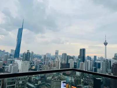 a view of a city from the top of a skyscraper at Axon suites bukit bintang Klcc by Aura in Kuala Lumpur