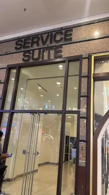 a store front with a sign that reads service solitude at BBS Suites At Times Square in Kuala Lumpur