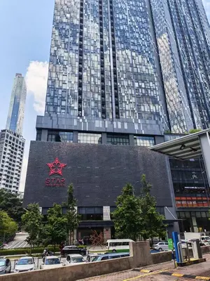 a building with a star sign on it in a city at Star Residences One KLCC in Kuala Lumpur