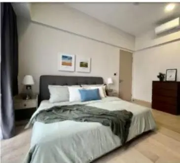 a bedroom with a large bed in a room at Star Residences One KLCC in Kuala Lumpur