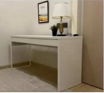 a white desk with a lamp on top of it at Star Residences One KLCC in Kuala Lumpur