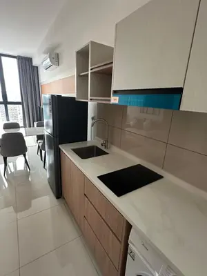 a kitchen with a sink and a dishwasher at Ubays Majestic House in Kuala Lumpur