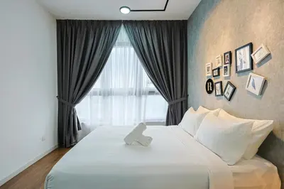 a bedroom with a large white bed with a window at M Vertica Residences by The Clover, Maluri , Cheras , Kuala Lumpur , KLCC, Free Parking in Kuala Lumpur