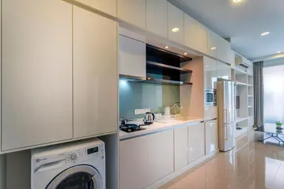 a kitchen with a washer and a washing machine at Platinum near KLCC Kuala Lumpur in Kuala Lumpur