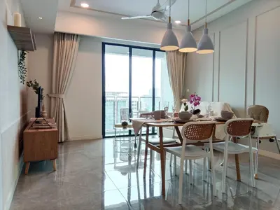 a dining room with a table and chairs at Ooak Suites Mont Kiara Mall 163 Babycot 4 Pax in Kuala Lumpur