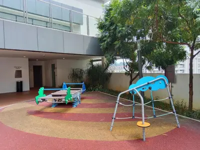 a group of playground equipment in front of a building at Ooak Suites Mont Kiara Mall 163 Babycot 4 Pax in Kuala Lumpur