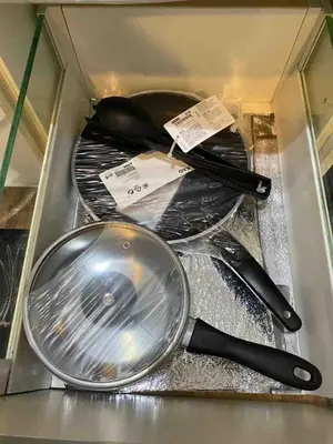 three pans sitting on top of a drawer at Setapak Central Mall in Kuala Lumpur