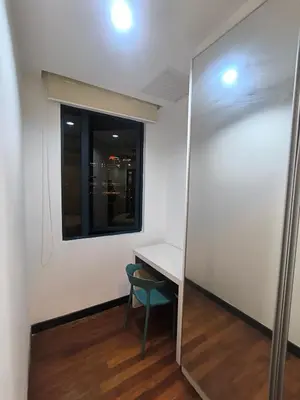 a small room with a table and a mirror at 013A2 Casa Residency- Sweet Home 2R 2B in Kuala Lumpur