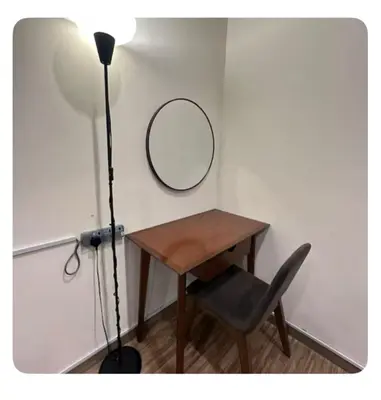 a desk with a mirror and a chair and a lamp at Setapak Central Mall Bathtub & Netflix in Kuala Lumpur