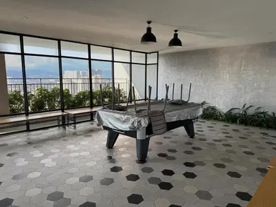 a living room with a piano in a room with windows at 1-4pax, Spacious Studio, Jalan Ipoh KL The Pano in Kuala Lumpur