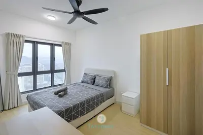 a bedroom with a bed and a ceiling fan at 15min to Mid Valley - M Arisa Sentul KL for 5 in Kuala Lumpur