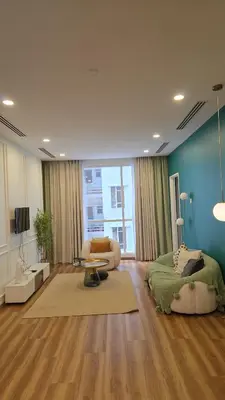 a living room with a bed and a table in it at Binjai 8 KLCC Premium Soho By Prime Suites in Kuala Lumpur