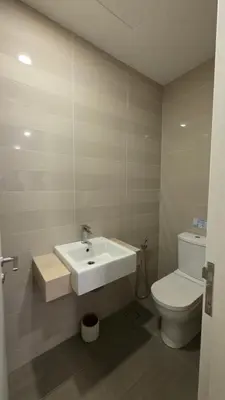 a bathroom with a sink and a toilet at Binjai 8 KLCC Premium Soho By Prime Suites in Kuala Lumpur