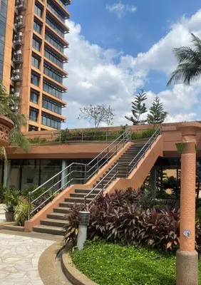 a building with a staircase in front of a building at Elegant Apartment at Times Square in Kuala Lumpur