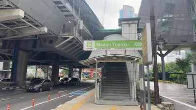 a metro train station with stairs and a sign at Luxury couple suite 307A at Majestic Residence in Kuala Lumpur