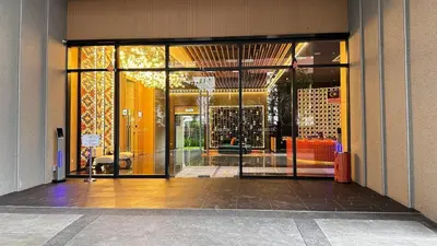 an entrance to a building with a glass door at Luxury suite 293A at KLCC in Kuala Lumpur