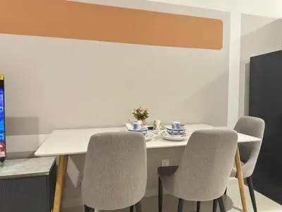 a dining room with a table and chairs at Luxury couple suite 23A3A at Majestic Residence in Kuala Lumpur