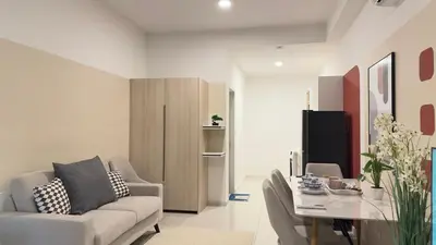 a living room with a couch and a table at Luxury couple suite 251B at KLCC in Kuala Lumpur