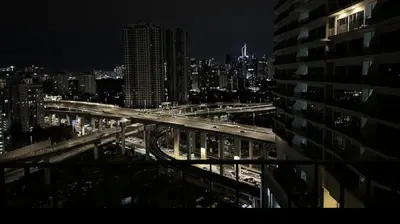 a view of a city at night with traffic at Datum Jelatek SKY Ring VIP Nice View in Kuala Lumpur