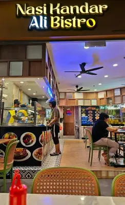 a fast food restaurant with people waiting at the counter at Datum Jelatek SKY Ring VIP Nice View in Kuala Lumpur