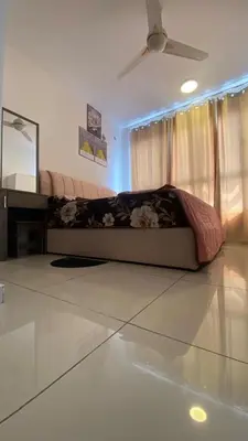 a living room with a couch and a table at COZY Kenwingston The platz Setapak 3BR&2BR 5-8PAX FREE WIFI PARKIN NETFLIX 3306 in Kuala Lumpur