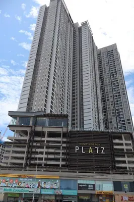 a tall building with a sign on it at COZY Kenwingston The platz Setapak 3BR&2BR 5-8PAX FREE WIFI PARKIN NETFLIX 3306 in Kuala Lumpur