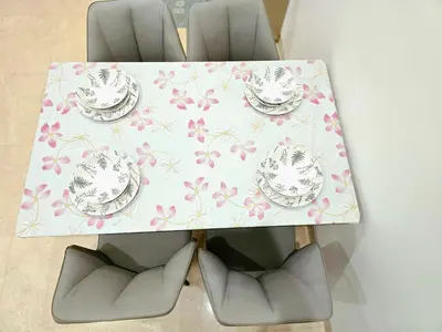 a table with plates and dishes on it at Lucentia Residence Infinity swimming pool BY Lalaport in Kuala Lumpur