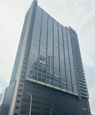 a tall glass building with a lot of windows at Luxury copule suite 232A at KLCC in Kuala Lumpur