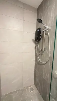 a shower in a bathroom with a shower at Klcc view Luxe suite 295B at Majestic Residence in Kuala Lumpur