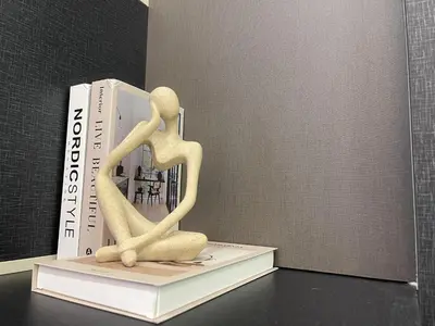 a book sitting on top of a table at Sentral Suites KL Sentral Kuala Lumpur by Nestaway in Kuala Lumpur