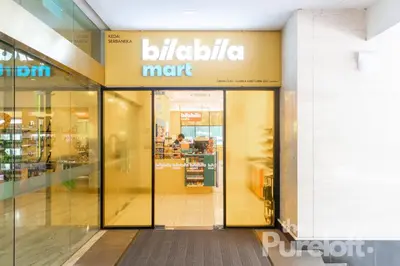 an entrance to a mall with a bul retailer mart sign at The Pureloft Suites - Bukit Bintang KLCC in Kuala Lumpur