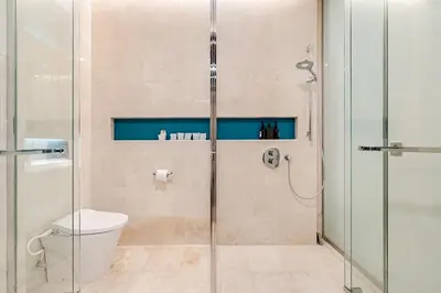 a bathroom with a shower and a toilet at Romantic Home in KLCC in Kuala Lumpur