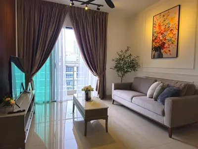 a living room with a couch and a large window at Cozy Velocity Residence2 Linked to Mall 6pax Wifi 600mbps in Kuala Lumpur