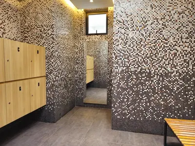 a bathroom with a wall of mosaic tiles at Cozy Velocity Residence2 Linked to Mall 6pax Wifi 600mbps in Kuala Lumpur