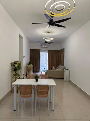 a dining room with a white table and a ceiling fan at Razak City Residence KL City in Kuala Lumpur