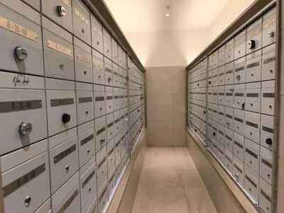 a row of lockers in a prison cell at Sky View Agile Residence Bukit Bintang KL in Kuala Lumpur