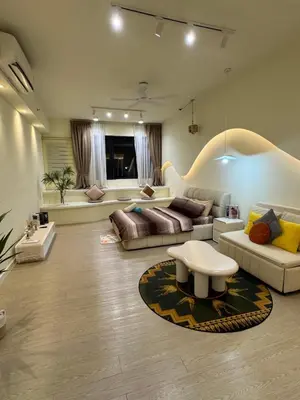 a large living room with a couch and a table at PWTC Chamber Rock by AZ Line in Kuala Lumpur
