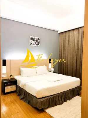 a bedroom with a large bed in a room at Swiss Garden Residence by The Layar Homes in Kuala Lumpur